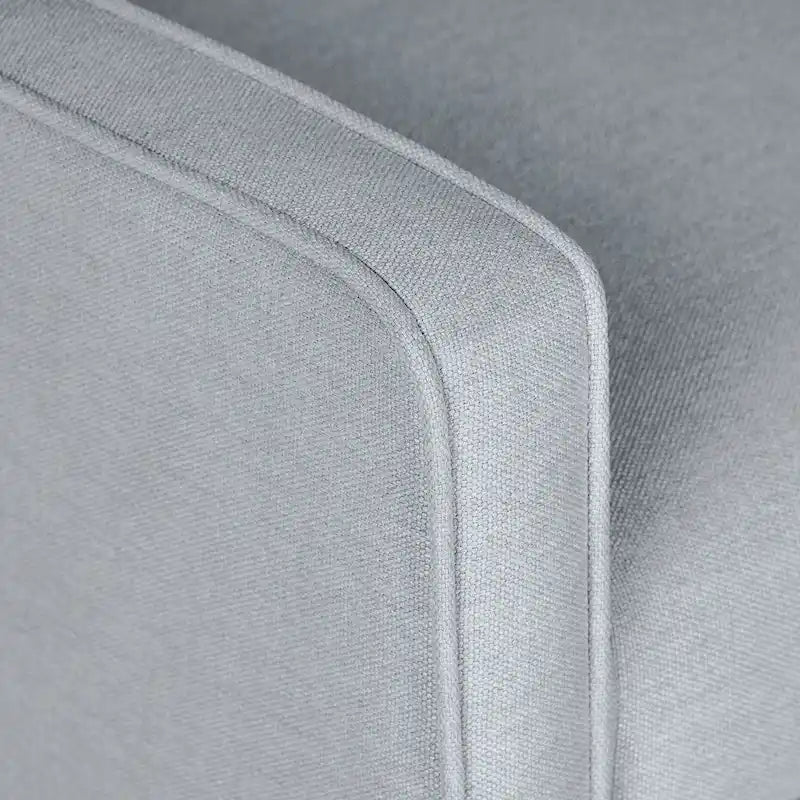 Fauteuil inclinable à dossier rembourré en tissu avec accoudoirs arrondis