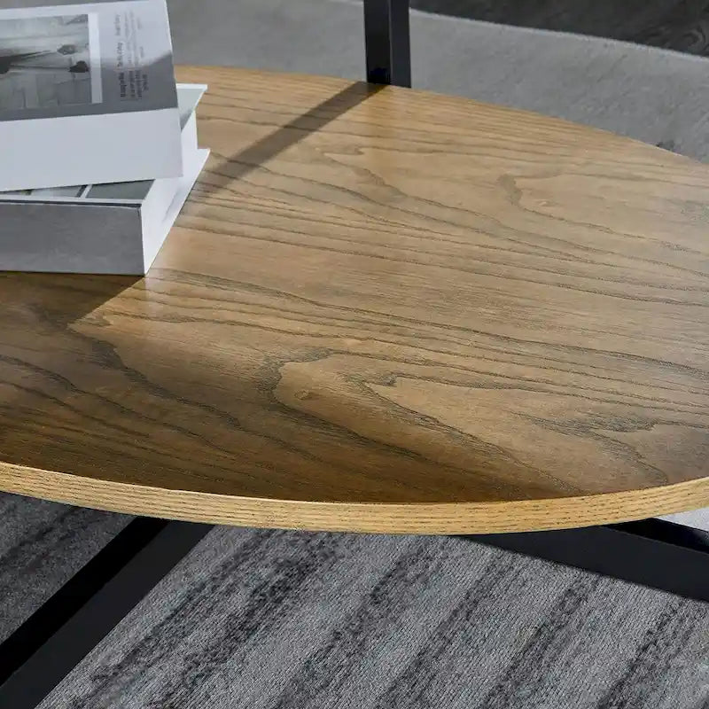 Table basse ovale en bois massif avec pieds métalliques croisés