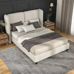 Lit plateforme moderne grand format en tissu résilient, avec tête de lit capitonnée à oreilles.