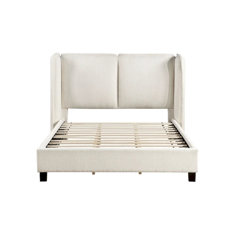 Lit plateforme moderne grand format en tissu résilient, avec tête de lit capitonnée à oreilles.