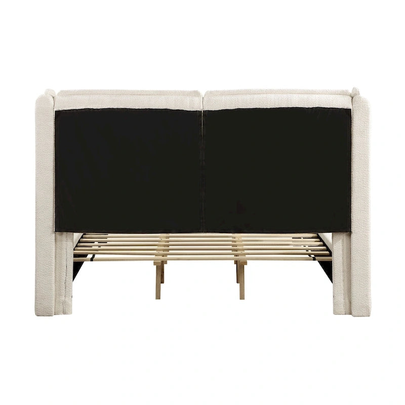Lit plateforme moderne grand format en tissu résilient, avec tête de lit capitonnée à oreilles.