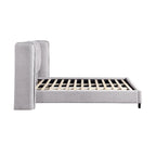 Lit plateforme moderne grand format en tissu résilient, avec tête de lit capitonnée à oreilles.